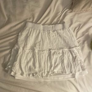 Really cute white skirt. Super great length and very comfortable!